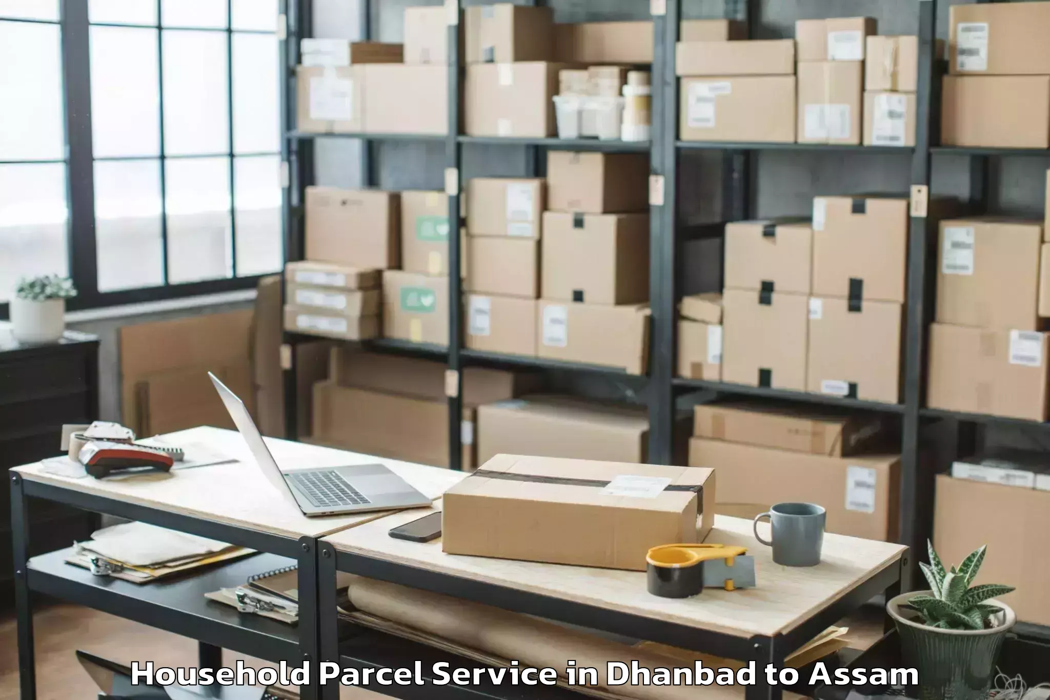 Easy Dhanbad to Guwahati University Household Parcel Booking